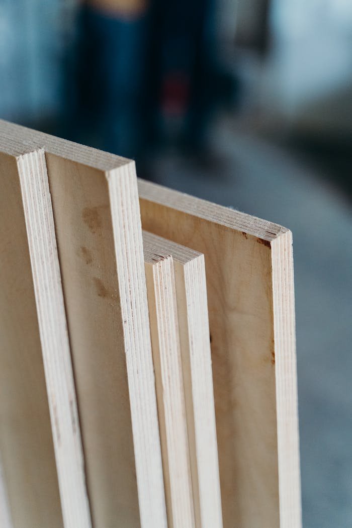 Detailed close-up of plywood panels angled on edge, showing texture and grain.